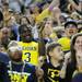 Former Michigan quarterback, senior Denard Robinson cheers in the stands during a break in the action in second half at the Final Four in Atlanta on Saturday, April 6, 2013. Melanie Maxwell I AnnArbor.com